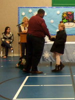Image: Sydney Lowenthall (fourth grader) shaking hands with ...