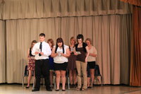 Image: The new NHS inductees recite the NHS ...