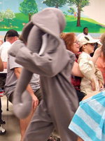 Image: The elephant comes marching through the crowd. ...