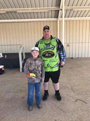 Image: Most fish caught and 3rd place junior Garrett Lennon with sponsor Kevin Janes from Line Cutterz